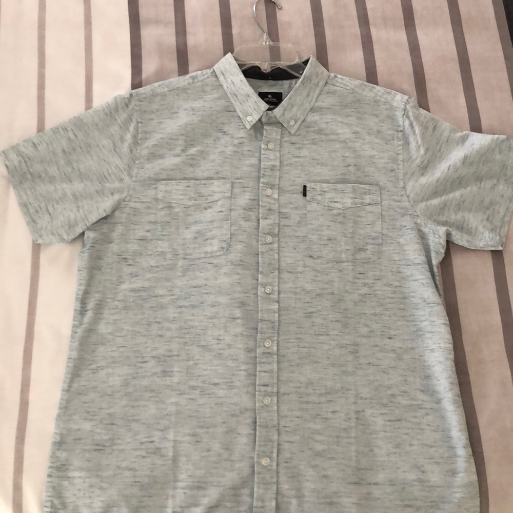 Rip curl button up shortsleeved shirt.